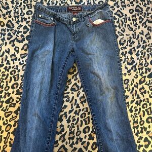 low rise bootcut sizzle jeans with red designs